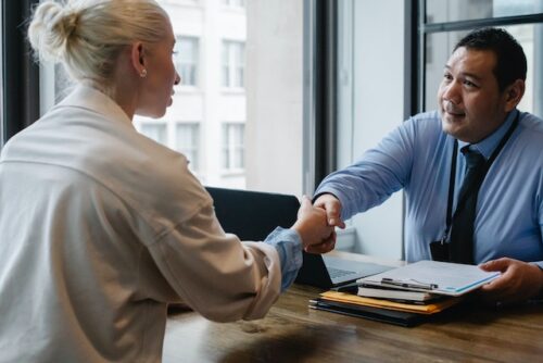 employer talking to woman about background checks