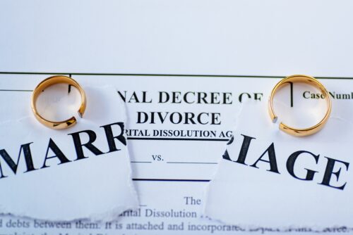 divorce decree and two wedding rings
